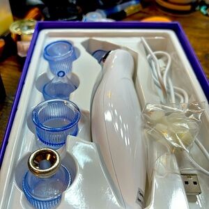 Appolus professional microdermabrasion.  New in the box never used.